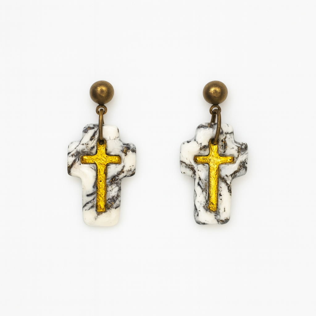 Handmade polymer clay howlite effect cross earrings with gold leaf and glossy stone-effect finish.