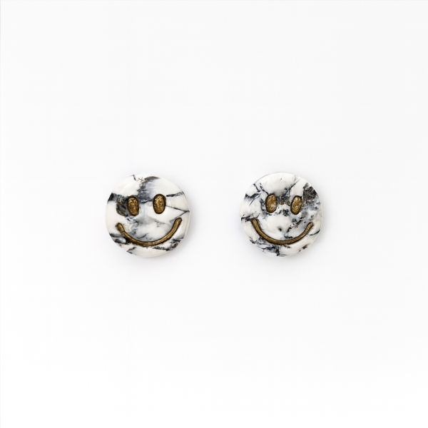 Handmade polymer clay howlite effect smiley earrings with gold leaf and glossy stone-effect finish.