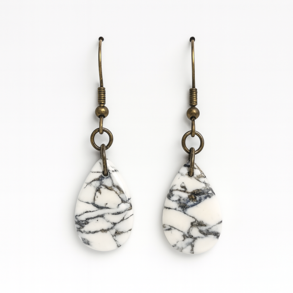 Handmade polymer clay howlite effect droplet earrings with gold leaf and glossy stone-effect finish.