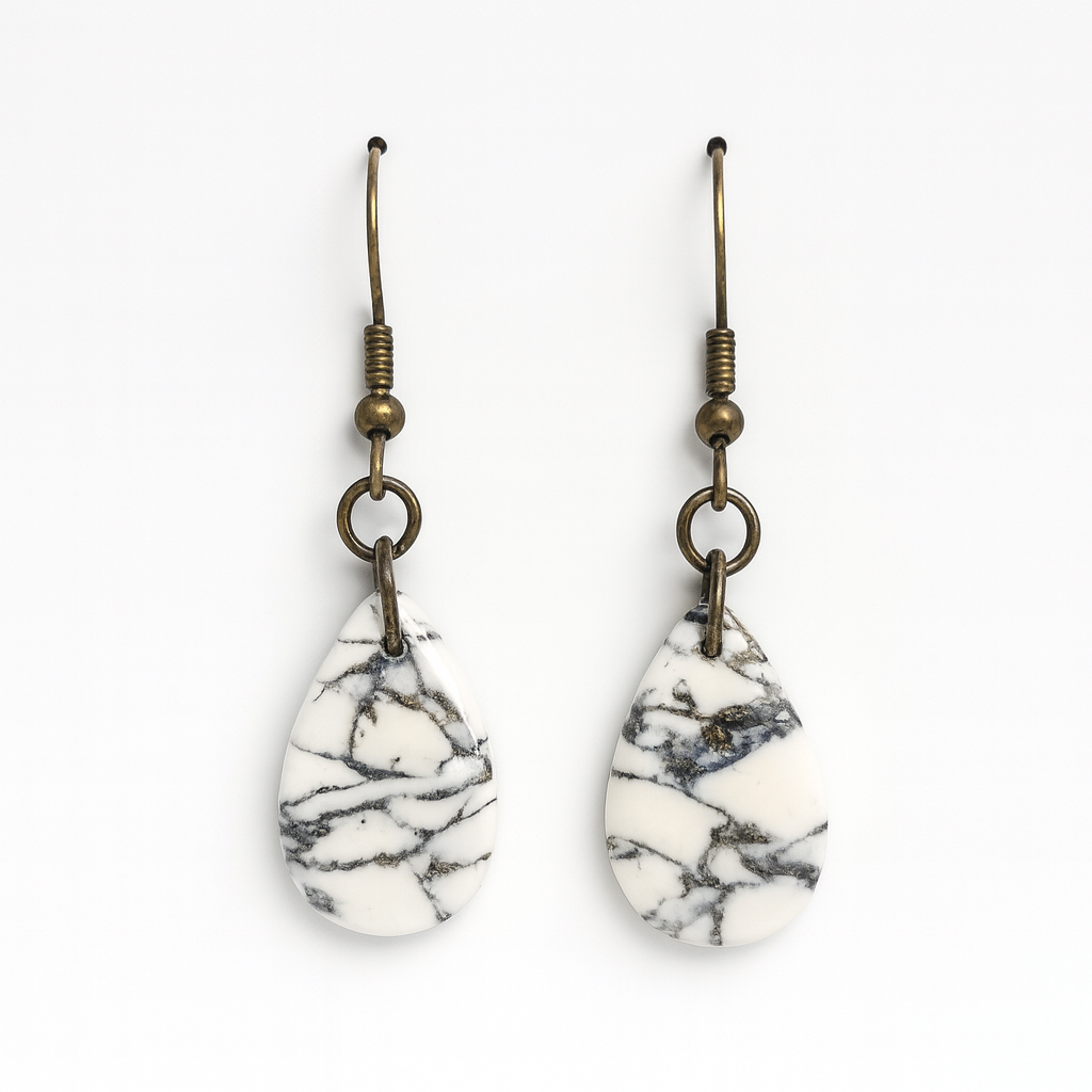 Handmade polymer clay howlite effect droplet earrings with gold leaf and glossy stone-effect finish.