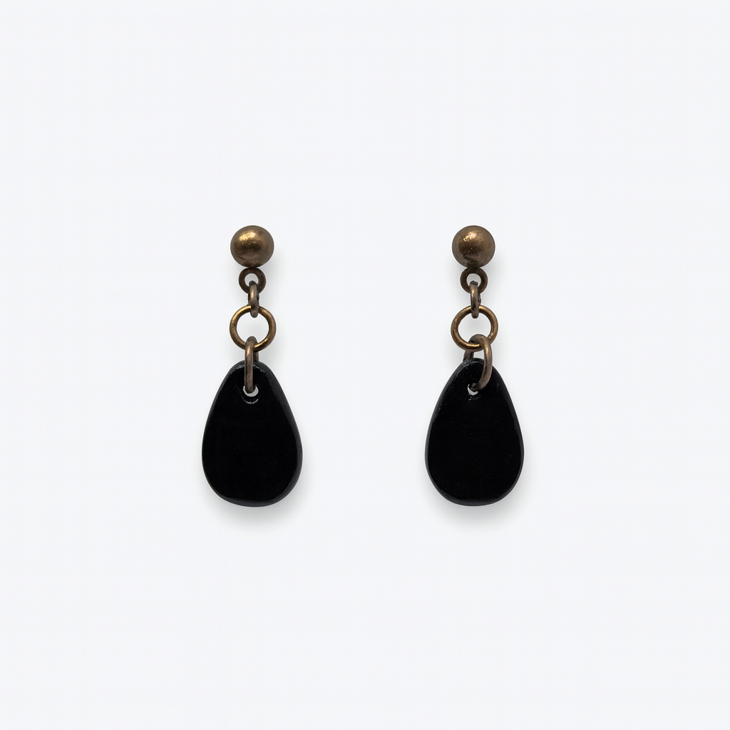 Handmade Jet Black Droplet Earrings with glossy black polymer clay droplets and antique bronze ball posts connected by jump rings.