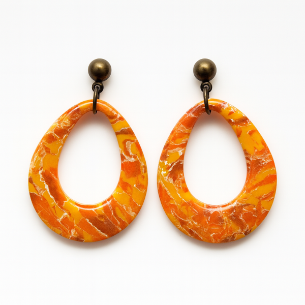 Handmade Autumn Flux Teardrop Earrings in marbled orange, yellow, and light brown polymer clay with white veining and antique gold ball posts.