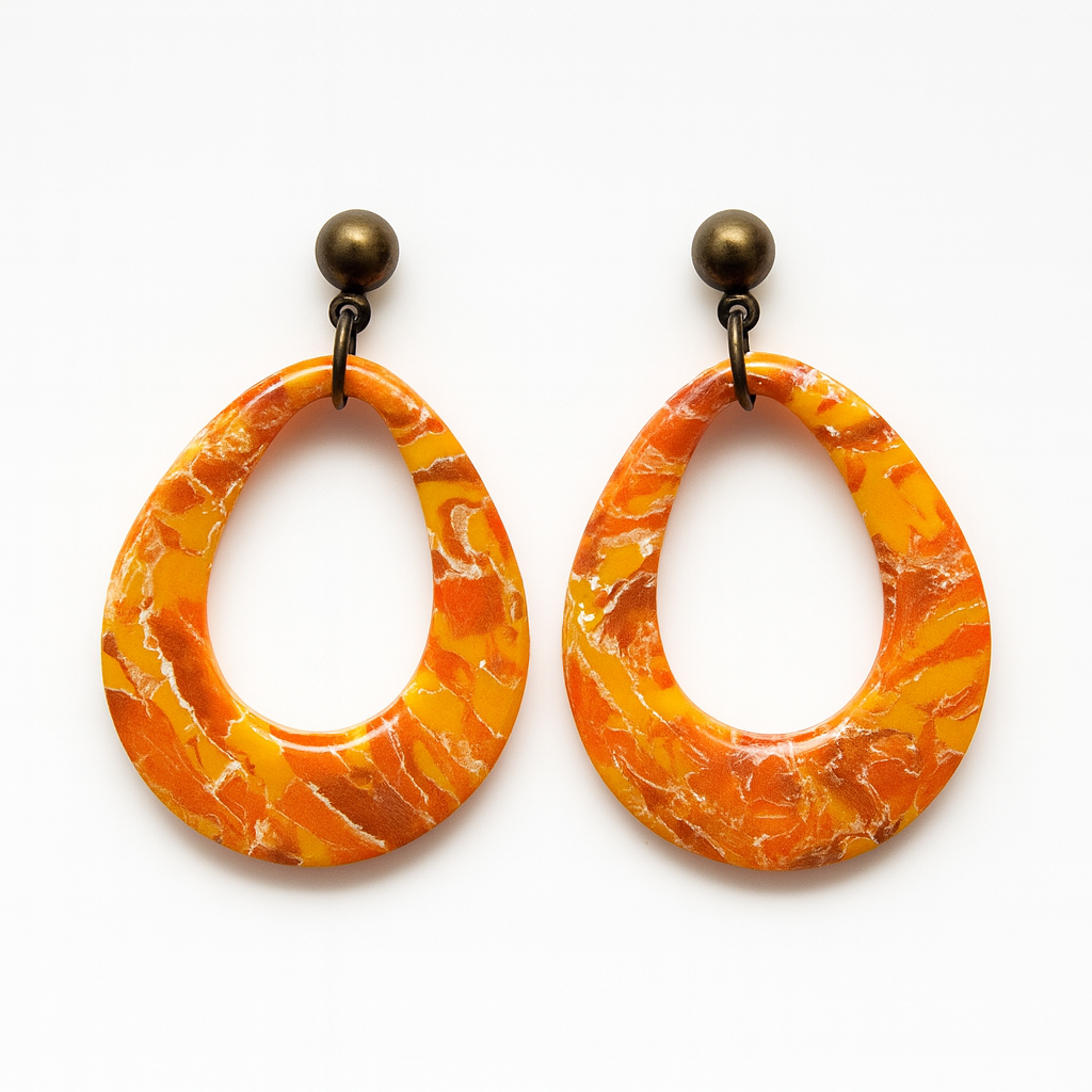 Handmade Autumn Flux Teardrop Earrings in marbled orange, yellow, and light brown polymer clay with white veining and antique gold ball posts.