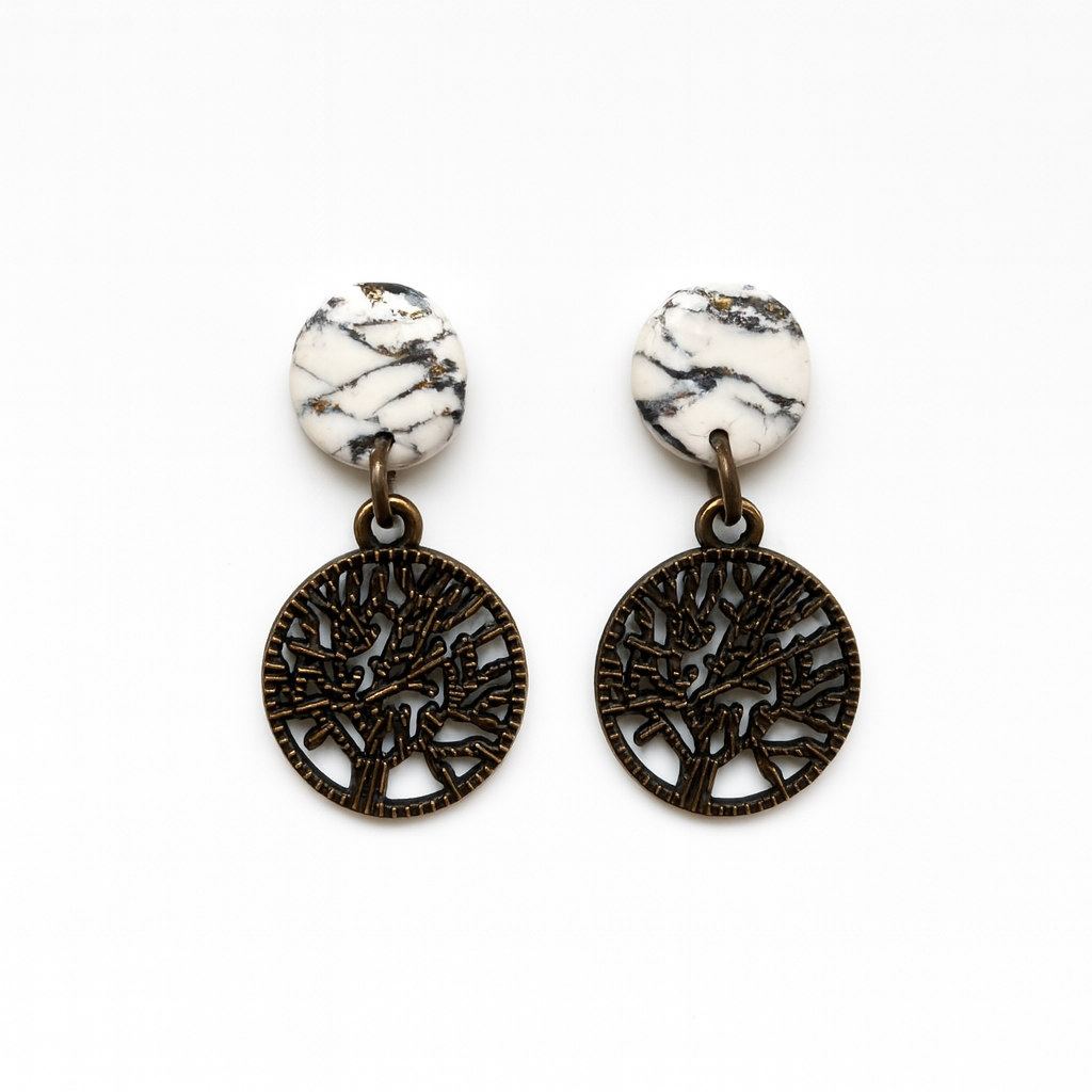 Handmade Howlite Effect Tree of Life Earrings with marbled white and black clay, gold foil veining, and bronze Tree of Life charms.