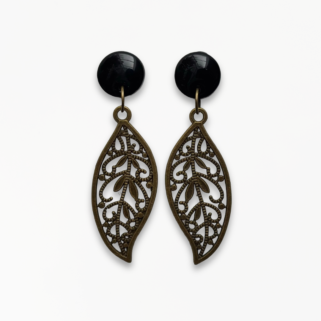 Handmade Jet Black Leaf Earrings with glossy black polymer clay studs and ornate antique bronze leaf charms.