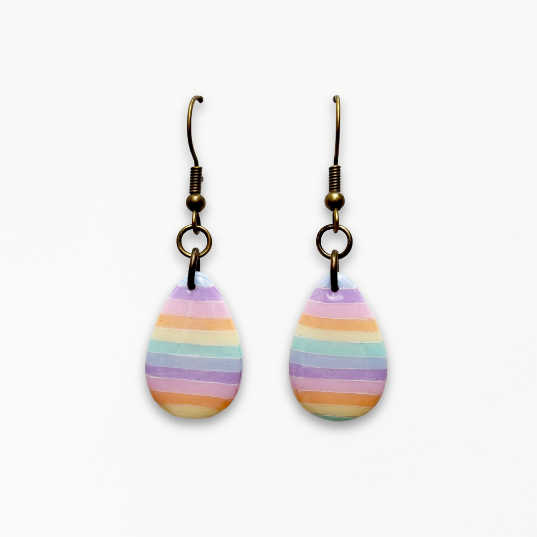 Handmade Pastel Glow Droplet Earrings with pastel rainbow stripes in pink, lilac, blue, mint, yellow, and peach polymer clay.