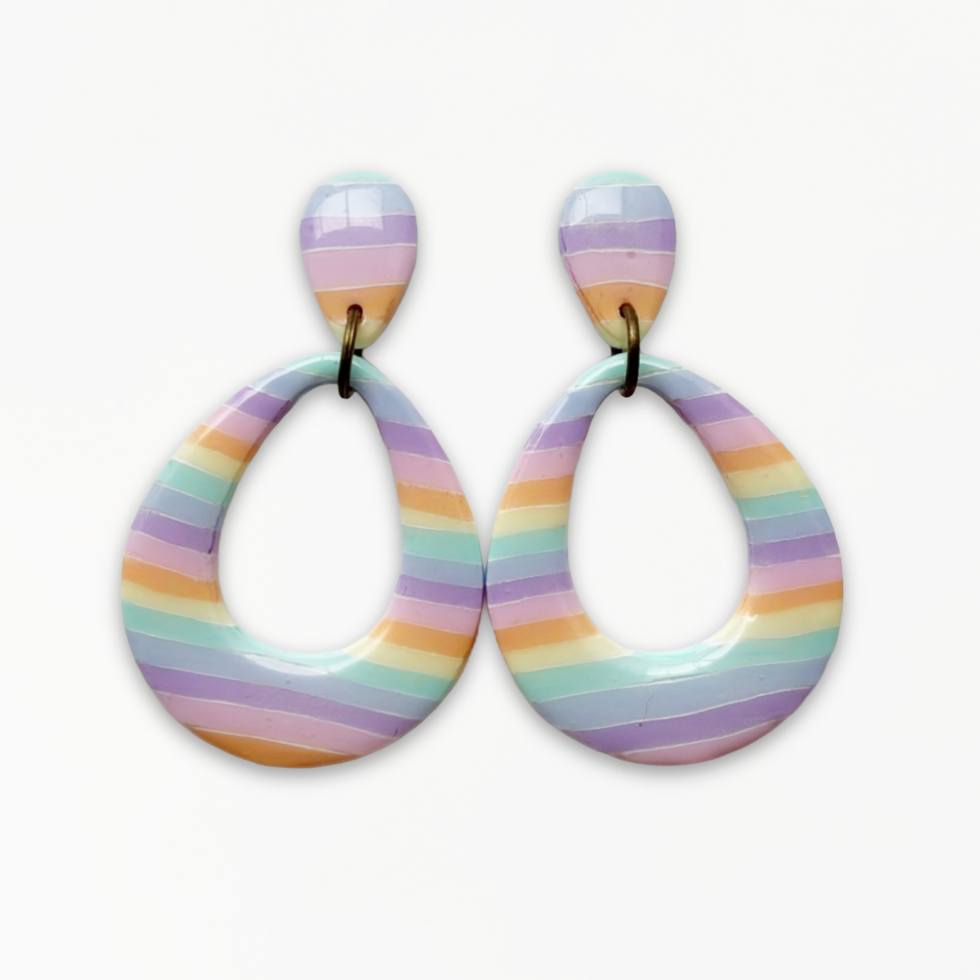 Handmade Pastel Glow Teardrop Earrings with pastel rainbow striped polymer clay and antique bronze findings.