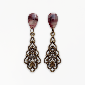 Crimson Veil Filigree Earrings handcrafted from marbled polymer clay with intricate antique bronze detailing