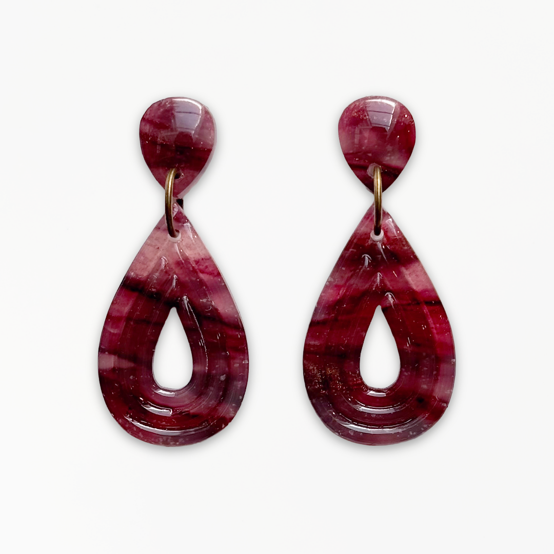 Crimson Veil Ribbed Teardrop Earrings handcrafted from marbled polymer clay with antique bronze detailing