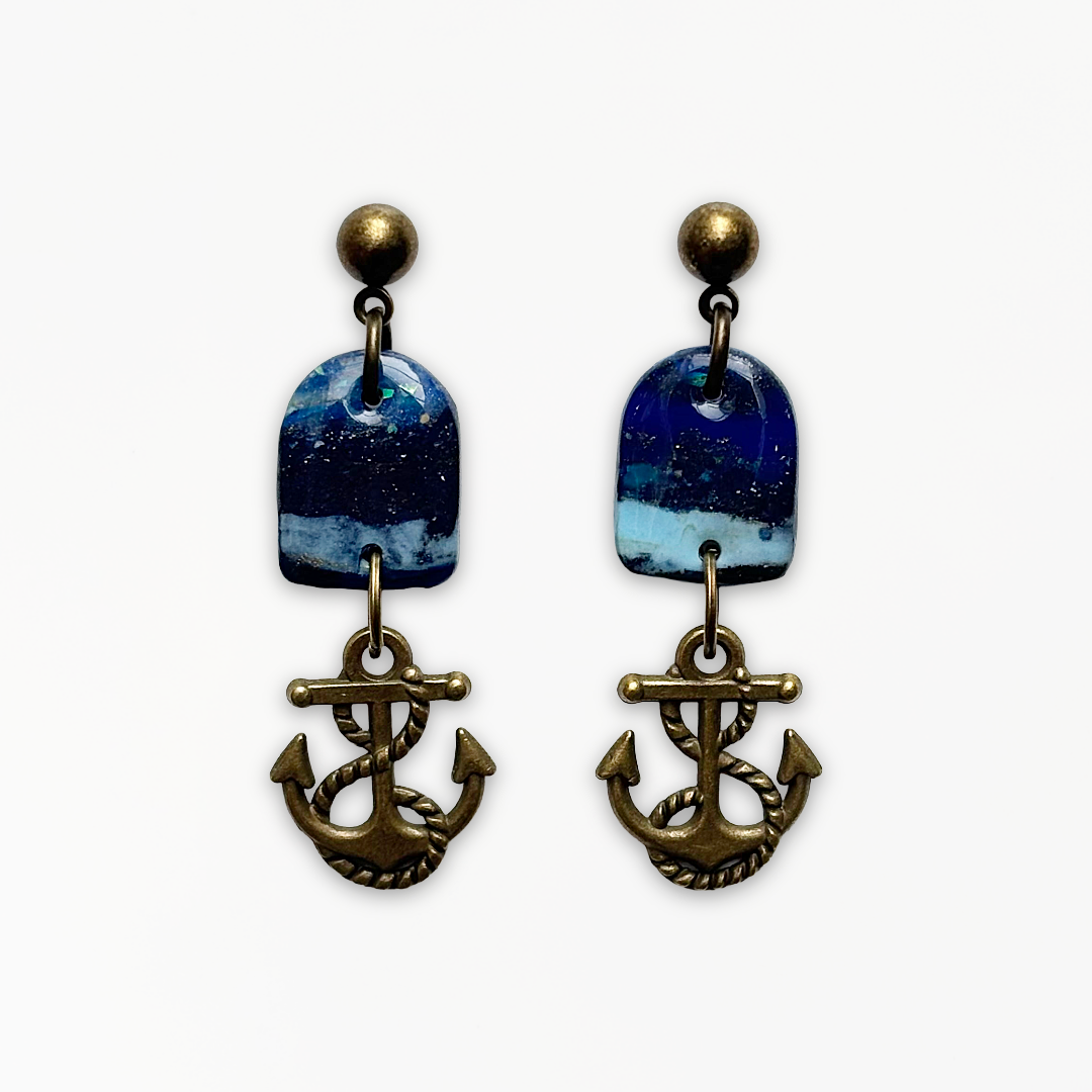 Handmade Deep Blue Anchor Earrings featuring marbled blue polymer clay with antique bronze anchor charms.