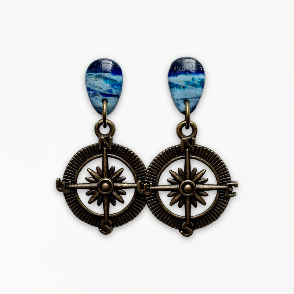 Handmade Deep Blue Compass Earrings featuring marbled navy, cobalt and turquoise polymer clay with antique bronze compass charms.